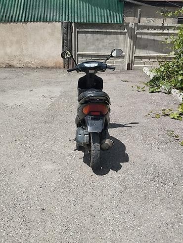 хонда истеп 1: Скутер түрү Honda, 50 куб. см, Бензин — 2