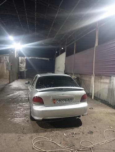 2 8: Hyundai Accent: 1997 г., 1.4 л, Механика, Бензин, Лифтбек — 4