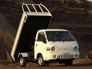 грузовая машина урал: Заказать Хендай портер, Вывоз строй мусора, С пирамидой — 1