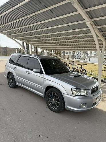 накладки на суппорта: Subaru Forester: 2003 г., 2 л, Автомат, Бензин, Кроссовер — 1