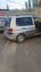 чехол на демио: Mazda Demio: 1999 г. — 6