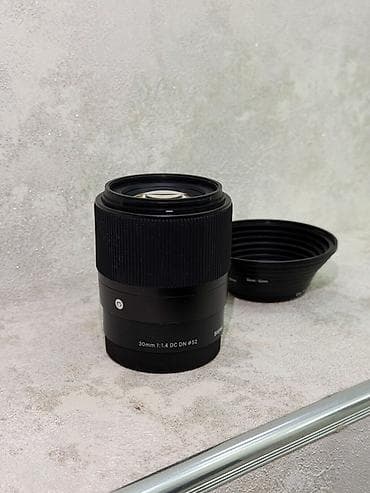 venom comp: Объектив SIGMA 30mm f/1.4 DC DN (ø52) - Фокусное расстояние: 30 мм — 1