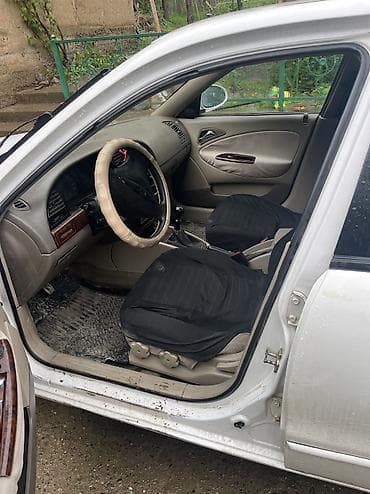 Продажа авто: Daewoo Nubira: 1999 г., 1.5 л, Механика, Бензин, Седан — 4