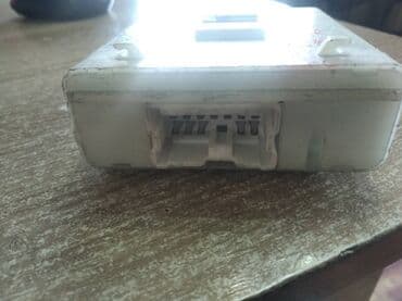 сигнализация с автозапуском и турботаймером: Nissan Cefiro A32 ЭБУ замка, Нисан Цефиро А32 электронный блок замка — 2