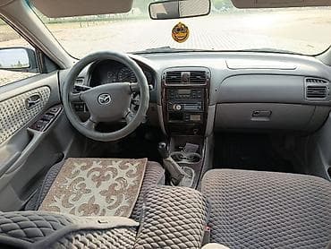 down pipe: Mazda 626: 2000 г., 2 л, Механика, Бензин, Хэтчбэк — 8