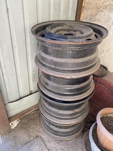 subaru accent: Железные Диски R 14 Комплект, отверстий - 4 — 1