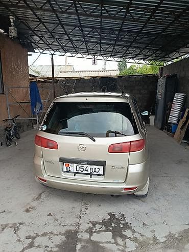 Транспорт: Mazda Demio: 2003 г., Бензин, Хэтчбэк — 5