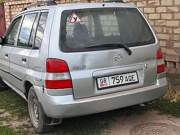динамические ключ: Mazda Demio: 2003 г., 1.5 л, Механика, Седан — 1