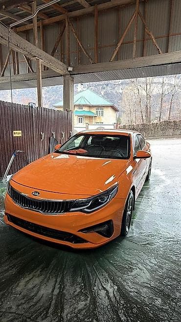 американский номер: Kia K5: 2019 г., Седан — 1