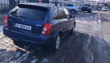 Mazda: Mazda 323: 2003 г., 1.3 л, Механика, Бензин, Универсал — 5