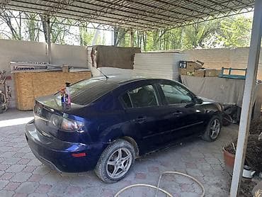 11 r20: Mazda 3: 2005 г., Седан — 6