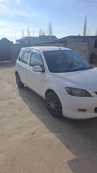 subaru forester автомобил: Mazda Demio: 2002 г., 1.3 л, Автомат, Бензин, Хэтчбэк — 2