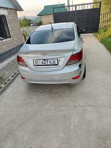 арзан матиз 1: Hyundai Solaris: 2012 г., 1.4 л, Кол менен иштөөчү, Бензин, Седан — 7