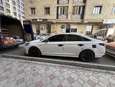 алфард сатуу: Белый седан с аэродинамическим обвесом и черными акцентами — 4