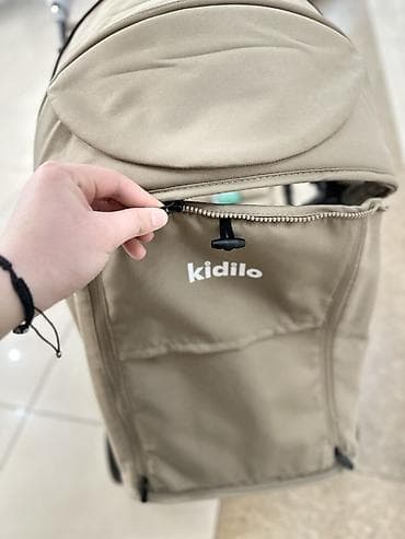 Прогулочная коляска Kidilo, бежевый цвет. Основные особенности: - — 7