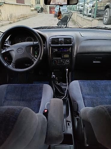 bmb e34: Mazda 626: 1998 г., 1.8 л, Механика, Бензин, Седан — 9