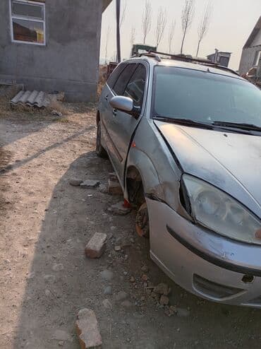 домкрать: Ford Focus: 2002 г., 0.8 л, Механика, Бензиновая, Универсал — 4