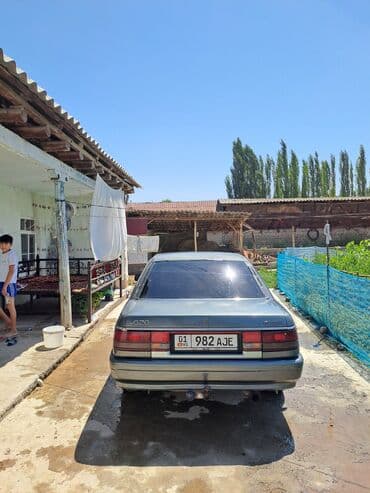 спарк 2: Mazda 626: 1990 г., 2 л, Механика, Бензин — 5