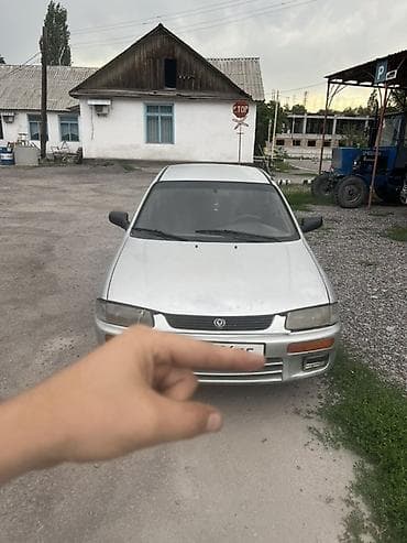 електро машина: Mazda 323: 1995 г., Седан — 2
