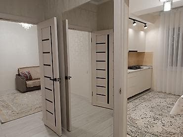 Недвижимость: 2 комнаты, 52 м², Элитка, 4 этаж, Евроремонт — 1