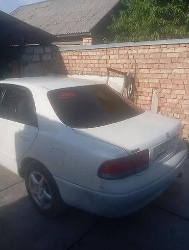 tesla p40: Mazda 626: 1992 г., 1.8 л, Механика, Бензин, Седан — 3