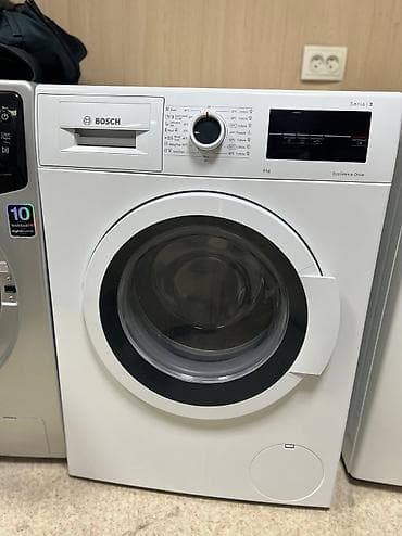 В продаже стиральная машина фирмы Bosch на 8 кг как новая идеальная