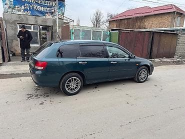 я ищу степ вагон: Просторный универсал темно-зелёного цвета с тонированными стёклами — 2