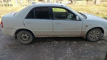 jetta 2: Седан белого цвета. Основные особенности: - Кузов: 4-дверный седан — 1