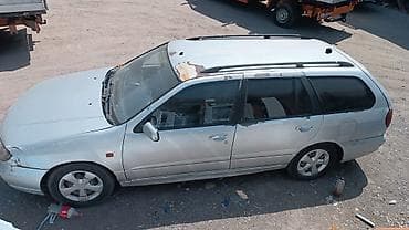 Nissan Primera: 2001 г., 1.8 л, Кол менен иштөөчү, Бензин, Универсал — 3