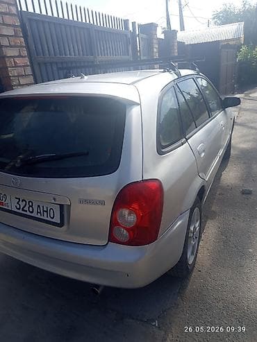 dot 4: Mazda 323: 2002 г., 1.6 л, Механика, Бензин, Универсал — 4