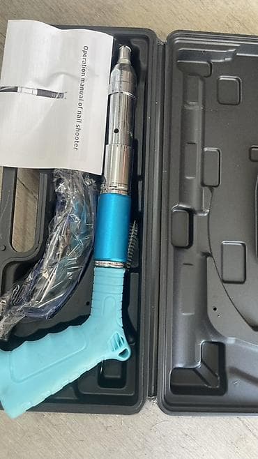 Пороховой/газовый строительный дюбель‑пистолет (nail shooter) в кейсе