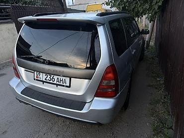 рейл: Subaru Forester: 2004 г., 2 л, Автомат, Газ, Универсал — 3