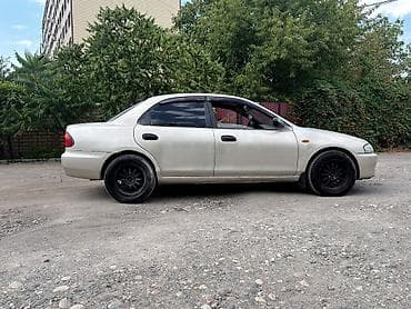 арбитальная машинка: Mazda 323: 1996 г., 1.5 л, Автомат, Бензин, Седан — 9