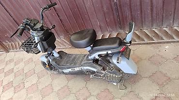 Электрический скутер/мопед городского типа. - Компоновка: низкая