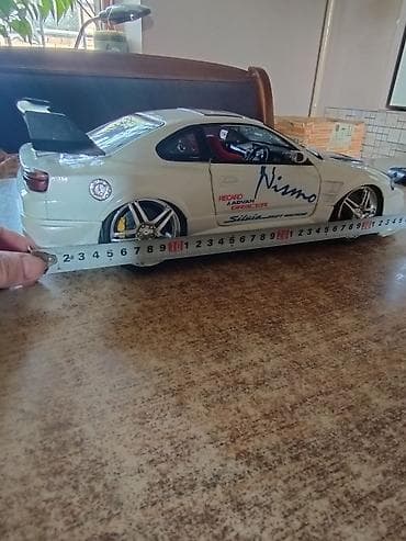 Спорт и отдых: Модель машины 1/12 NISSAN SILVIA 
NISSAN Motor c o.,L t D — 9