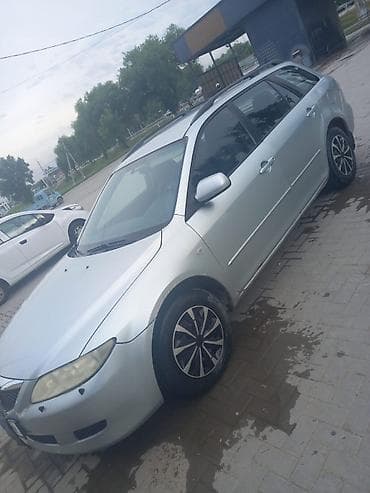 rexston khan: Mazda 6: 2003 г., Универсал — 5