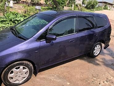 коричневый салон: Honda Stream: 2001 г., 2 л, Автомат, Бензин, Минивэн — 2