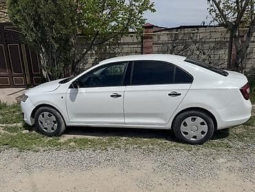 электромобиль лабо: Skoda Rapid: 2016 г., 1.6 л, Автомат, Бензин, Седан — 3