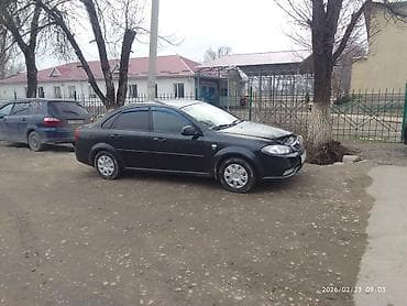 кио к5: Daewoo Gentra: 2013 г., 1.5 л, Механика, Газ, Седан — 4