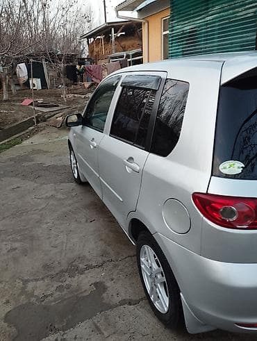 byd plus: Mazda Demio: 2004 г., 1.4 л, Автомат, Бензин, Седан — 2