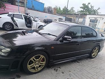гольф 2 тюнинг: Спортивный седан (чёрный) с тюнингом кузова и дисков. Основные — 1