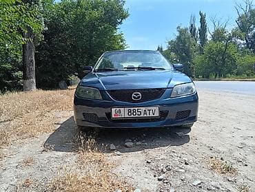 rd 1: Mazda 323: 2003 г., 1.6 л, Механика, Бензин, Универсал — 4