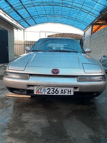 Mazda 323: 1991 г., 1.8 л, Механика, Бензин, Лифтбек