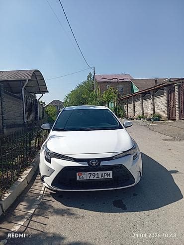 для круп: Toyota Corolla: 2021 г., 1.8 л, Автомат, Гибрид, Седан — 1