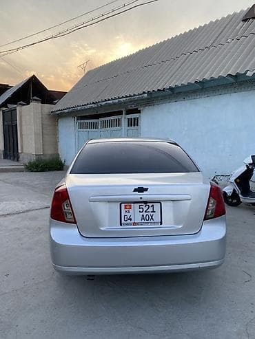Унаа: Chevrolet Lacetti: 2006 г., 1.4 л, Кол менен иштөөчү, Бензин, Седан — 4