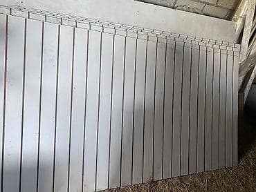 пленка винил: Стеновые/потолочные реечные панели (ламели) белого цвета. - Материал — 1