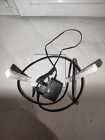 Wi‑Fi роутер с двумя внешними антеннами Описание: - Беспроводной