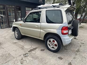 1: Mitsubishi Pajero iO: 1999 г., 1.8 л, Автомат, Бензин, Внедорожник — 4