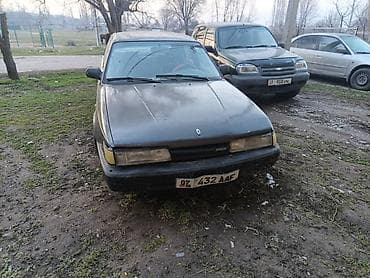 бампер маз: Mazda 323: 1990 г., Ручные, Бензин, Седан — 1