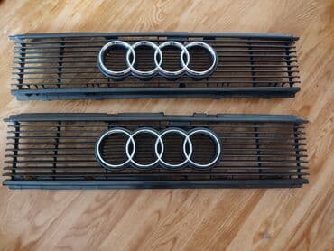 Кузовные детали: Решетка радиатора Audi 1985 г., Новый, Оригинал — 2